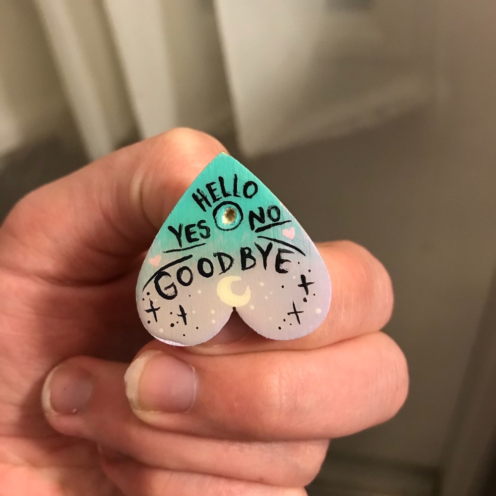 Purple and teal planchette